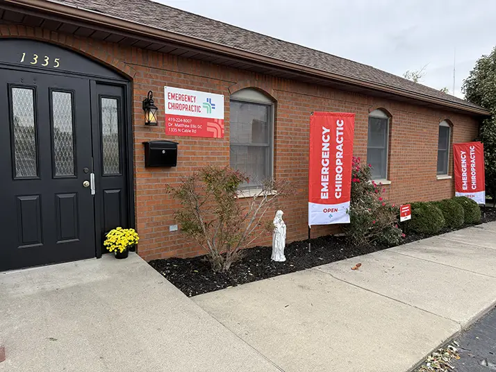 Front of the clinic. It is brick.